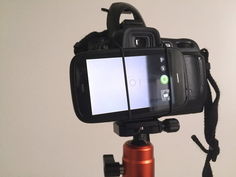 Camera with phone strapped on